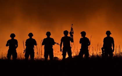 Soldiers regrouping after a training excercise (image source: http://nation.time.com/2012/08/02/sunset-soldier-silhouettes)