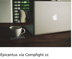 laptop with coffee cup
